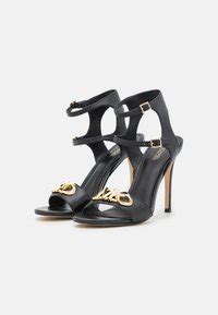 michael kors plateau sandalen harper|michael kors parker sandals.